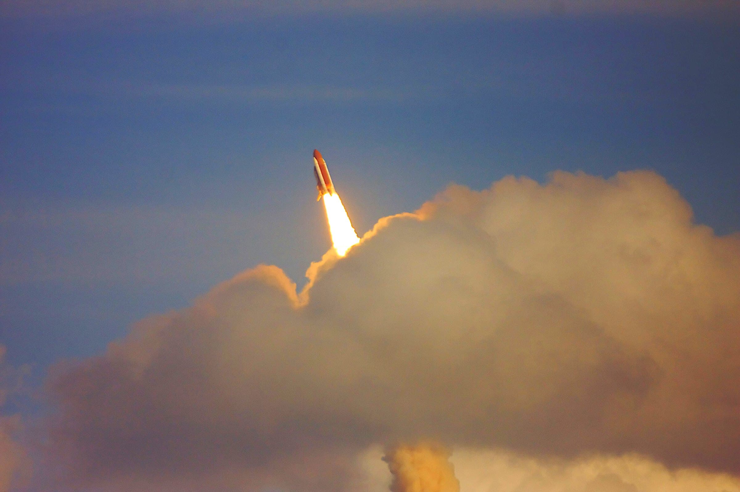 A red space shuttle launching — outbound sequences going out to the right people.